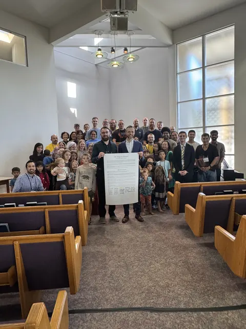 Conference attendees gathered together in the sanctuary