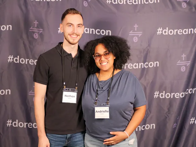 Attendees at the #doreancon photo backdrop