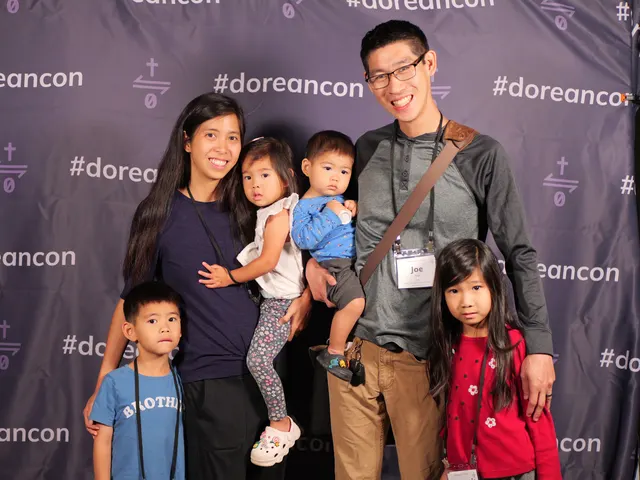 A family at the #doreancon photo backdrop